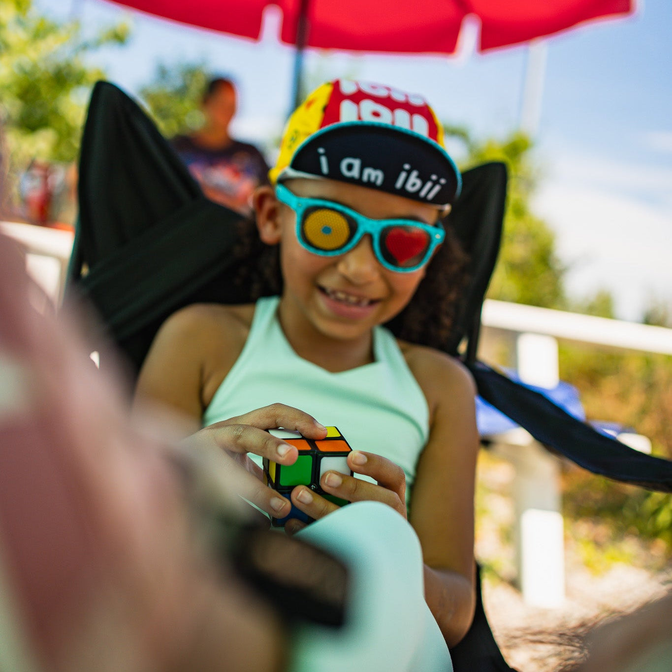 girl wearing ibii cap