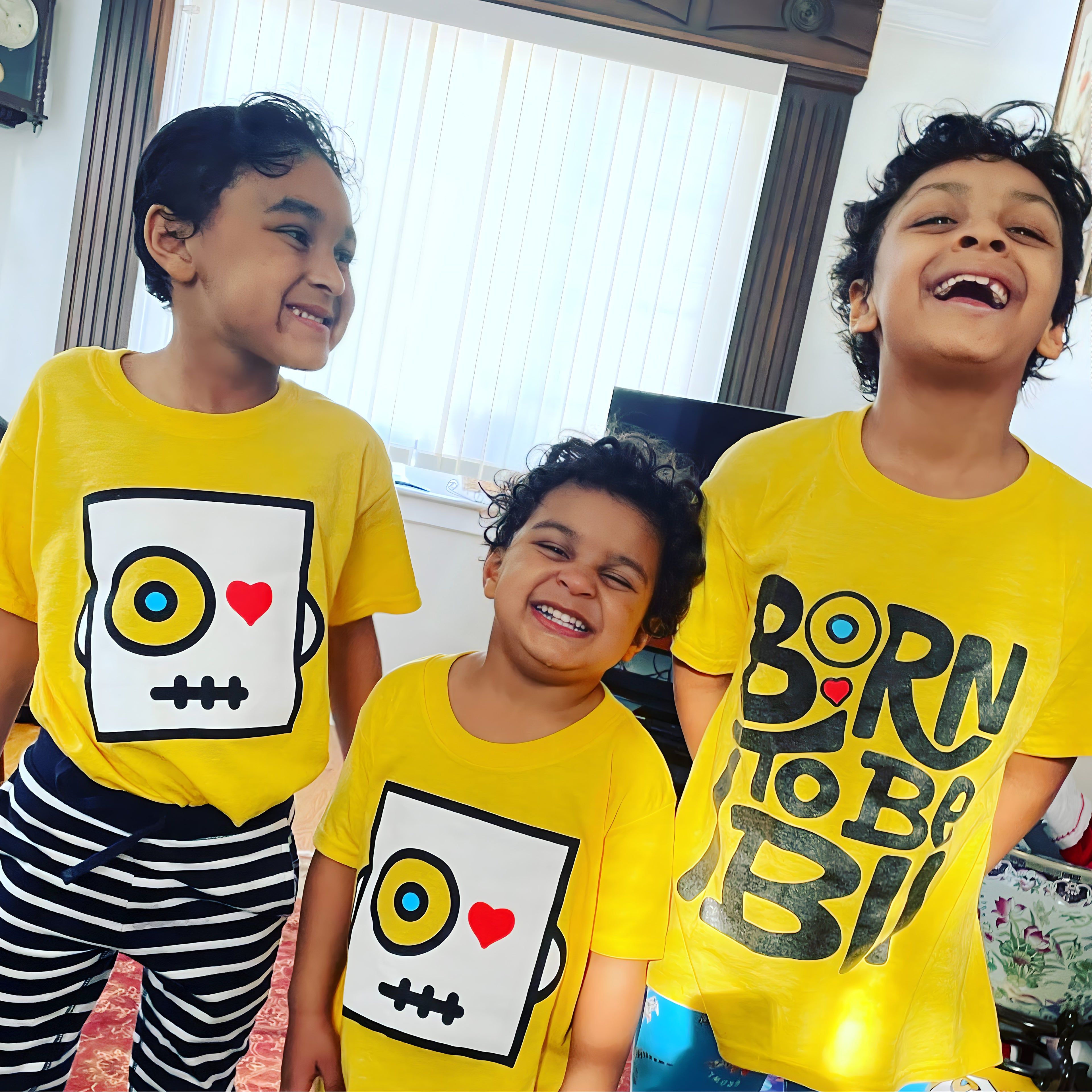 3 ibii kids weairng ibii T-shirts